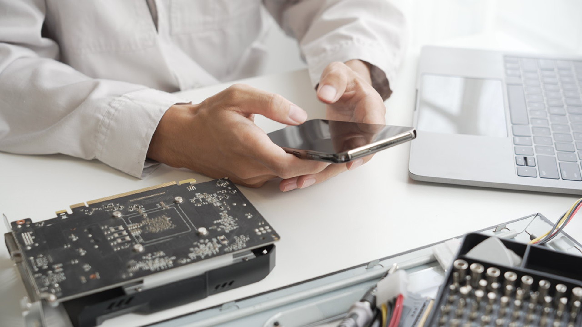 Closeup hand of computer hardware technician dissemble and  fixing computer PC.
